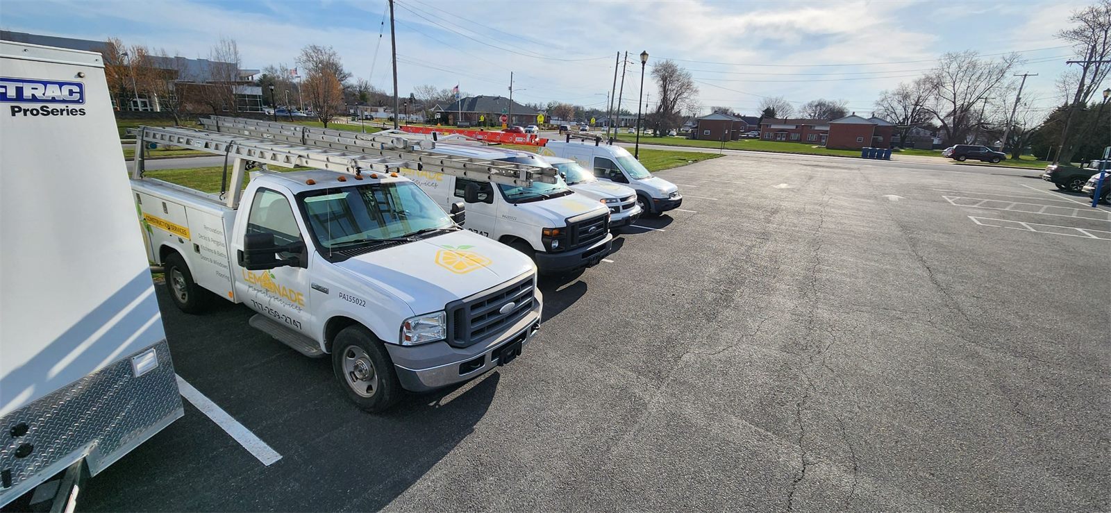 Lemonade Property Services trucks and vans