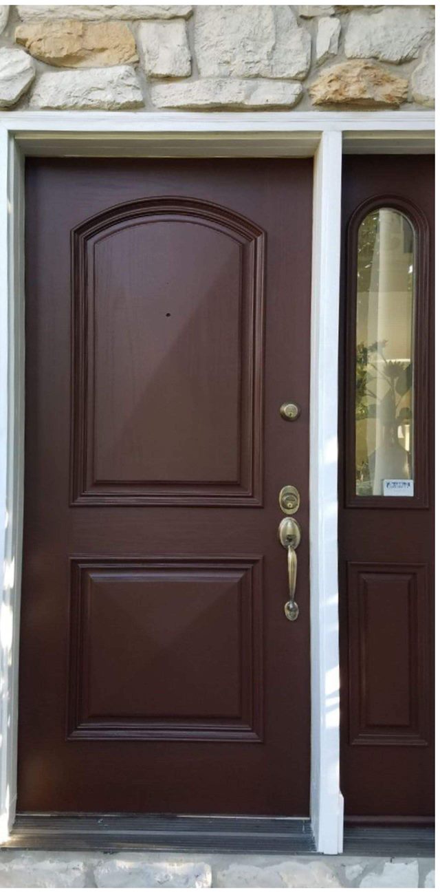 Same front door refinished in deep brown