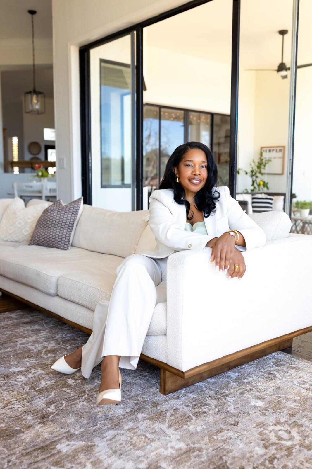 CEO of Design Lift Studio sitting in a modern designed living room