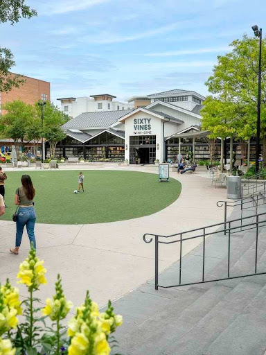Outdoor retail and dining space in The Woodlands showcasing community-focused and experience-driven lifestyle development Outdoor retail and dining space in The Woodlands showcasing community-focused and experience-driven lifestyle development