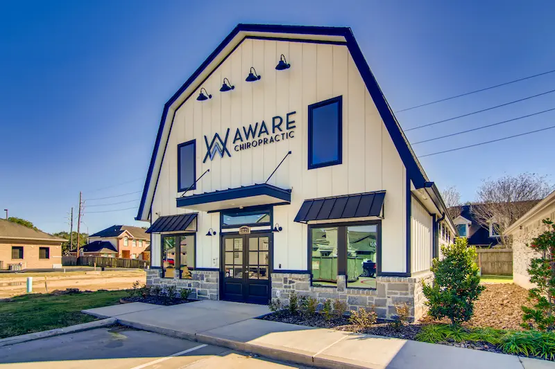 Aware Chiropractic barn style office building located at 23221 Red River Drive, Katy, TX 77494