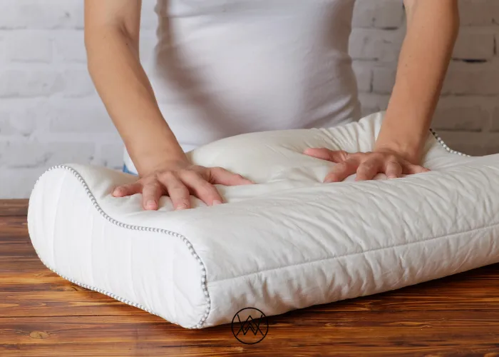 Person resting on a pillow with proper neck support