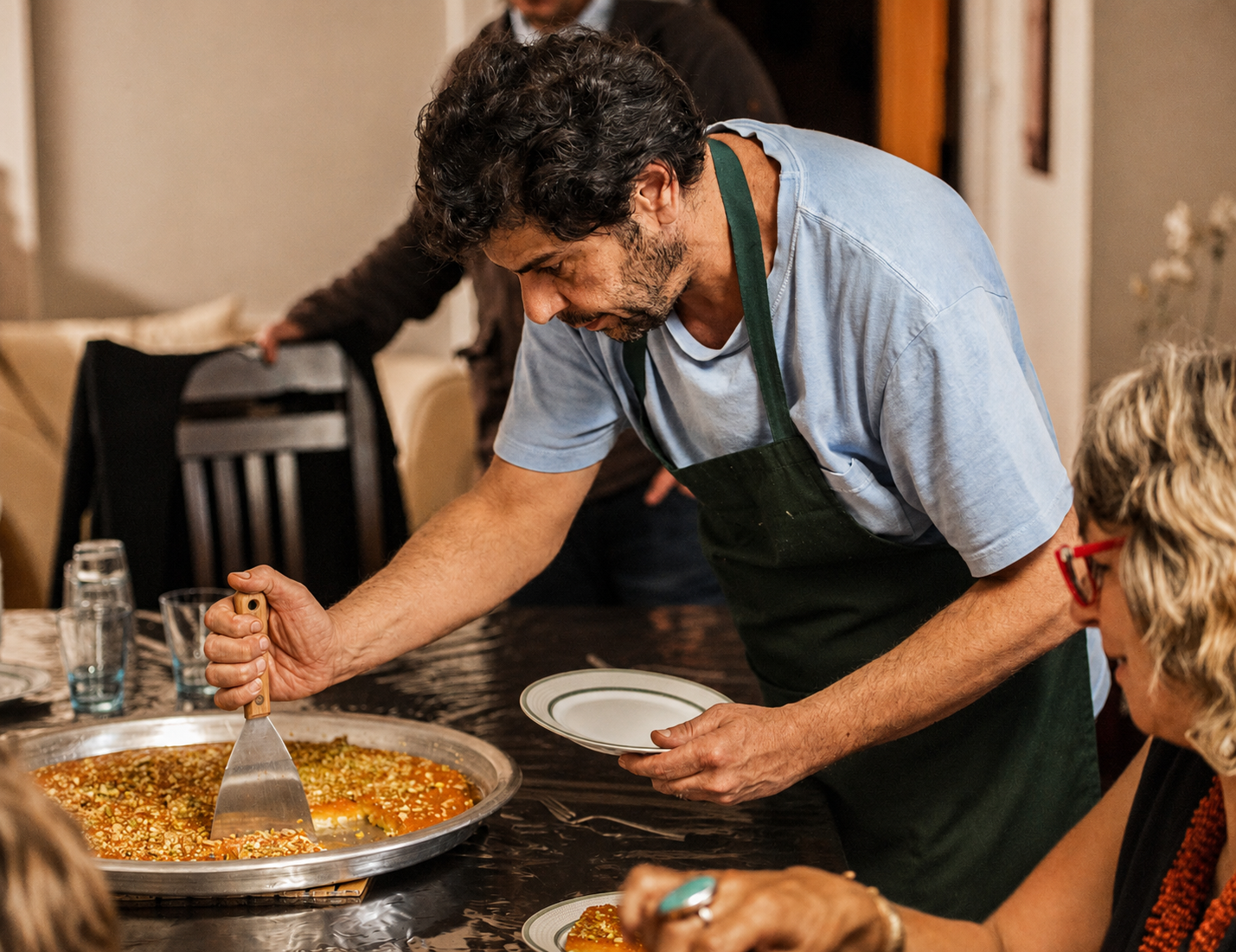 Mousa's Melbourne knafeh production kitchen with specialised machinery and trays of golden knafeh