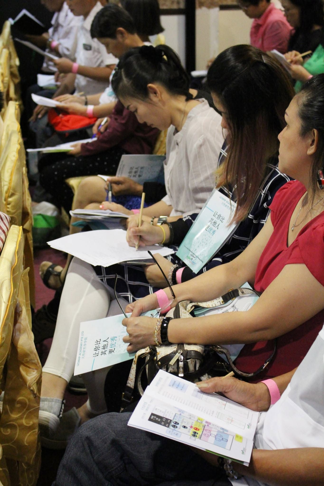 Participants reflecting on their learning at a UCMHP workshop