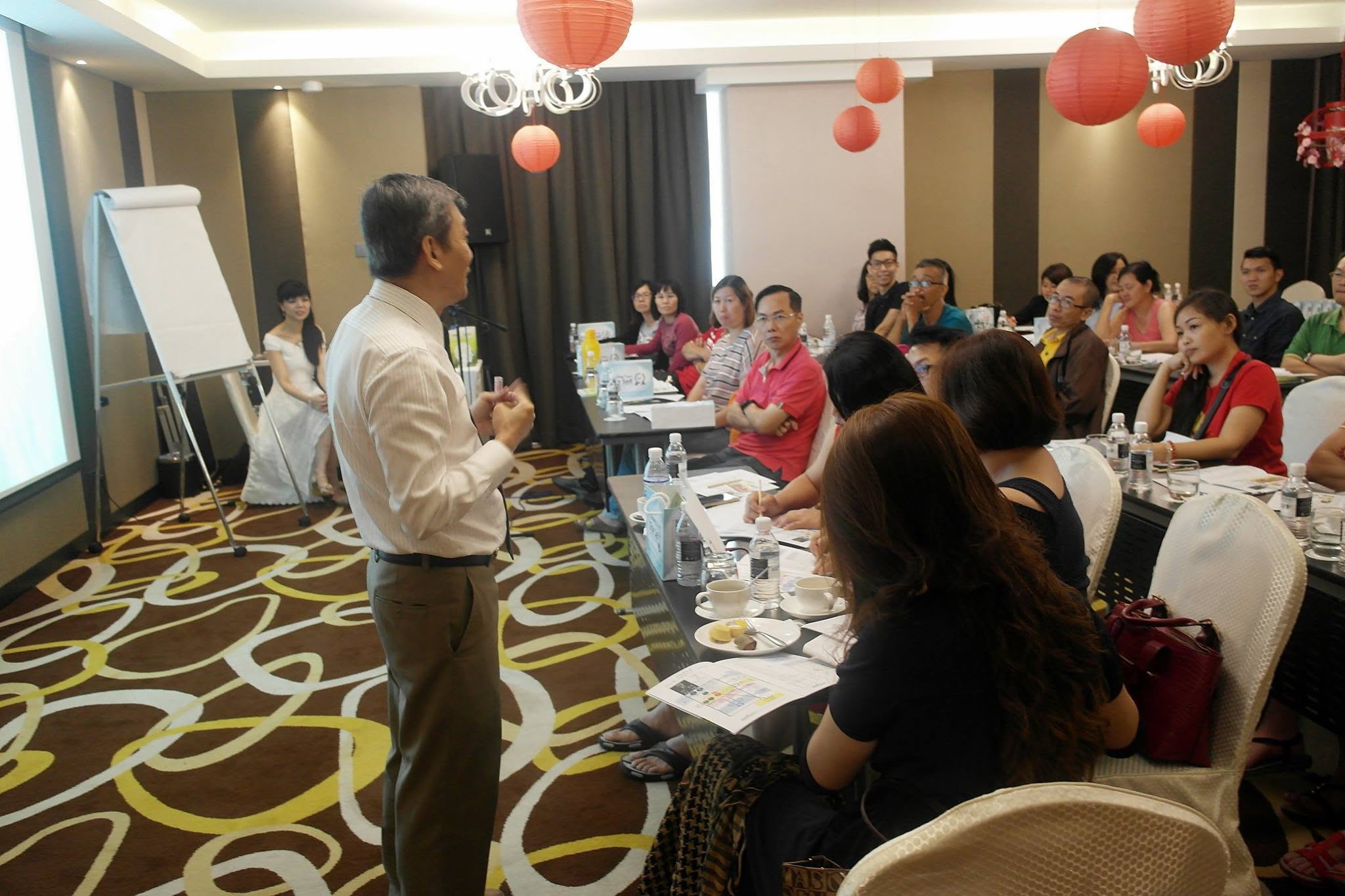 Dr. Bernard Yeo leading a UCMHP Academy learning session