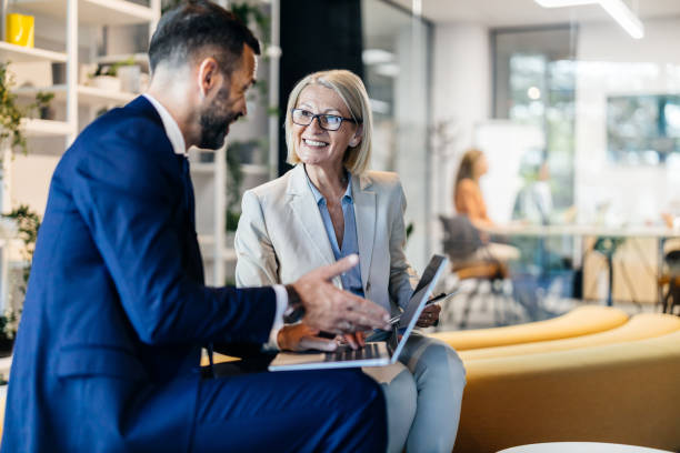 Two insurance professionals reviewing a plan together