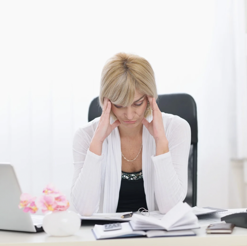Woman experiencing stress, anxiety and overwhelm during perimenopause and menopause Woman experiencing stress, anxiety and overwhelm during perimenopause and menopause