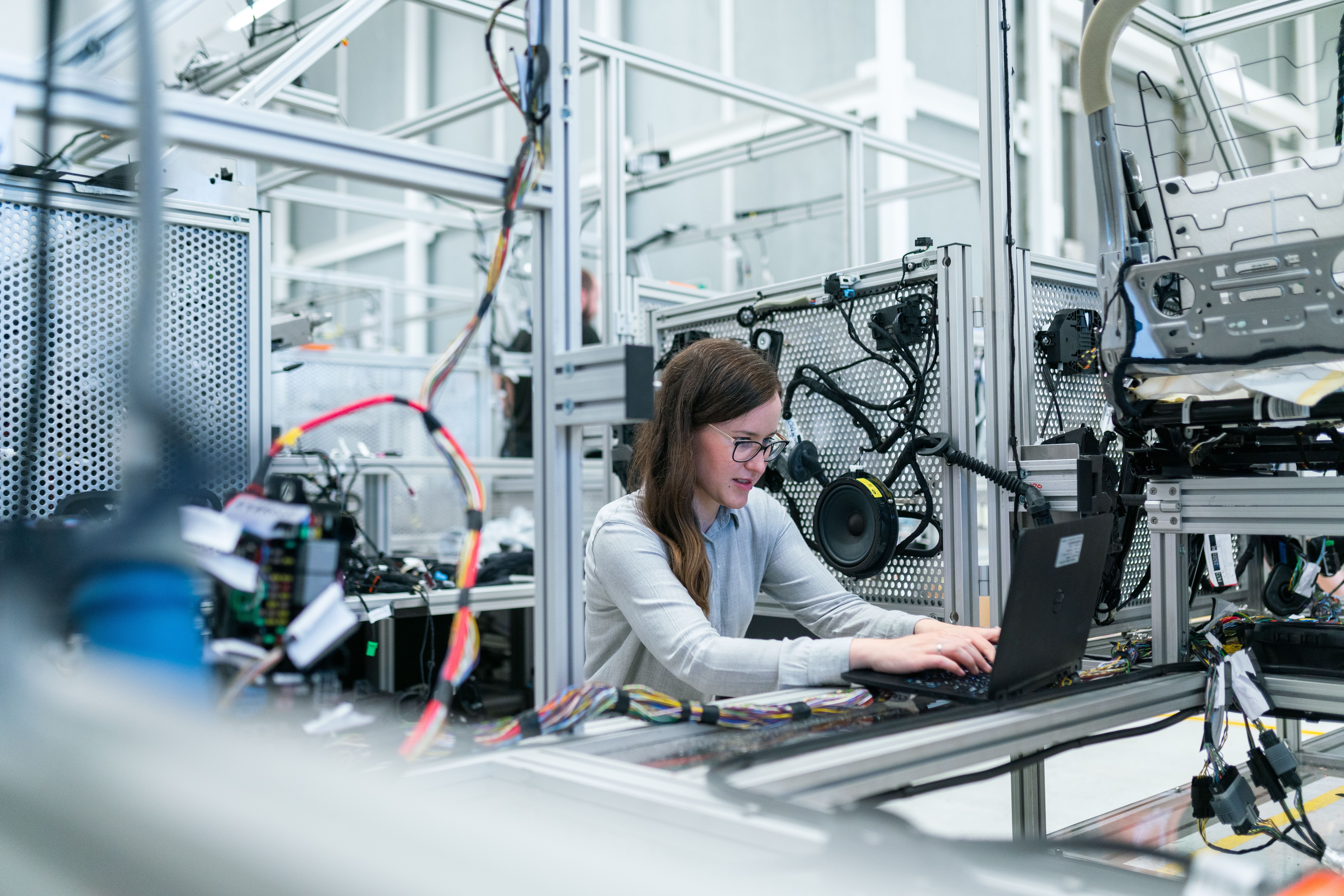 Engineer reviewing operational information in a modern workspace.