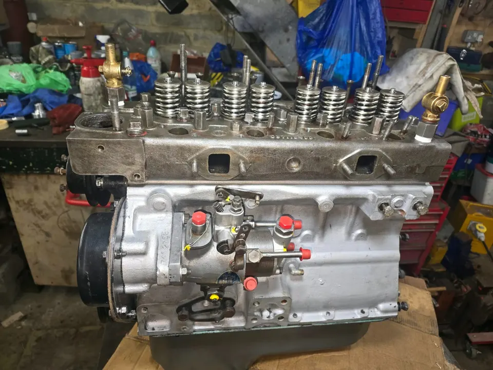 Classic diesel engine fully rebuilt and painted with new valve springs, ready to refit