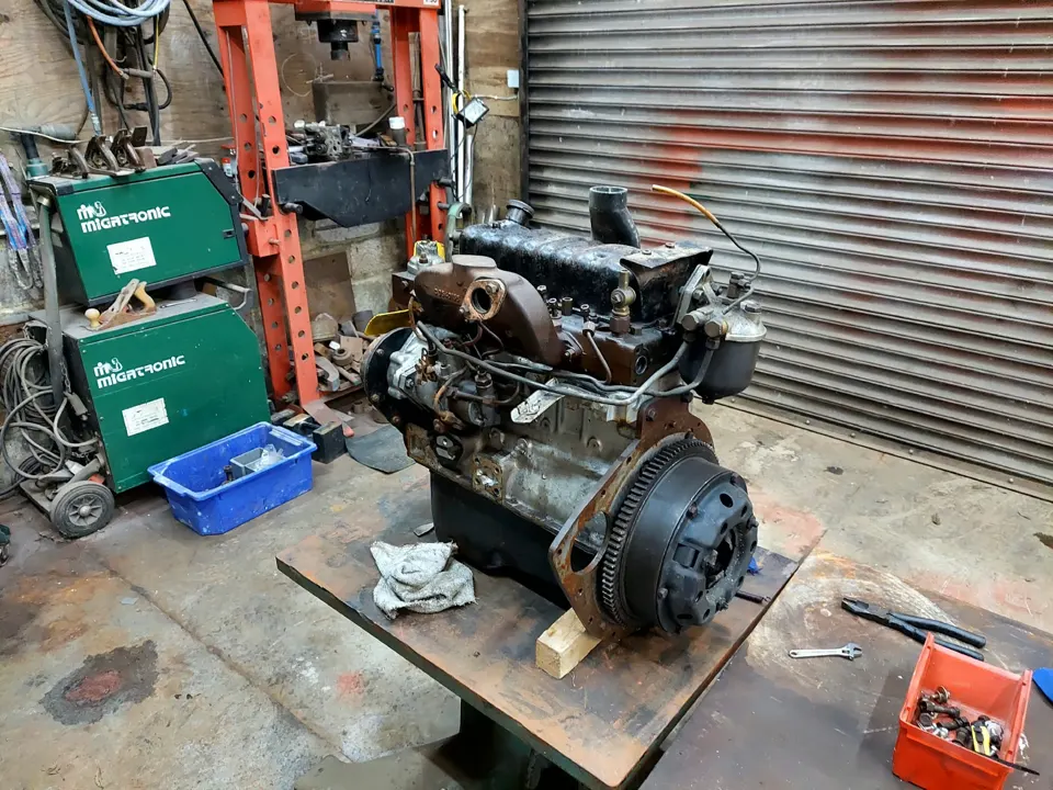 Classic diesel engine removed and mounted on the workbench