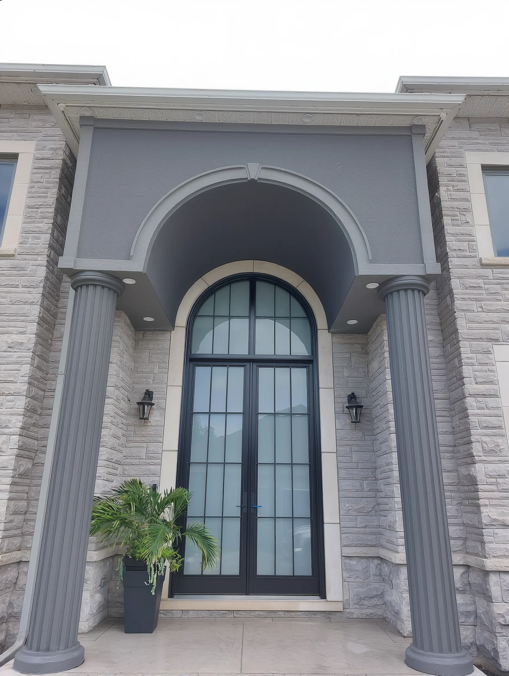 Custom home stucco arch and columns — Norfolk County