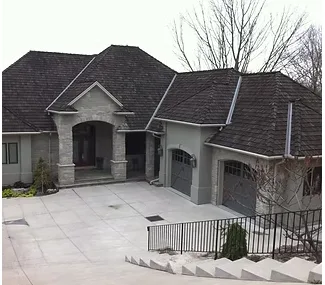 Custom home stucco exterior installation — Norfolk County