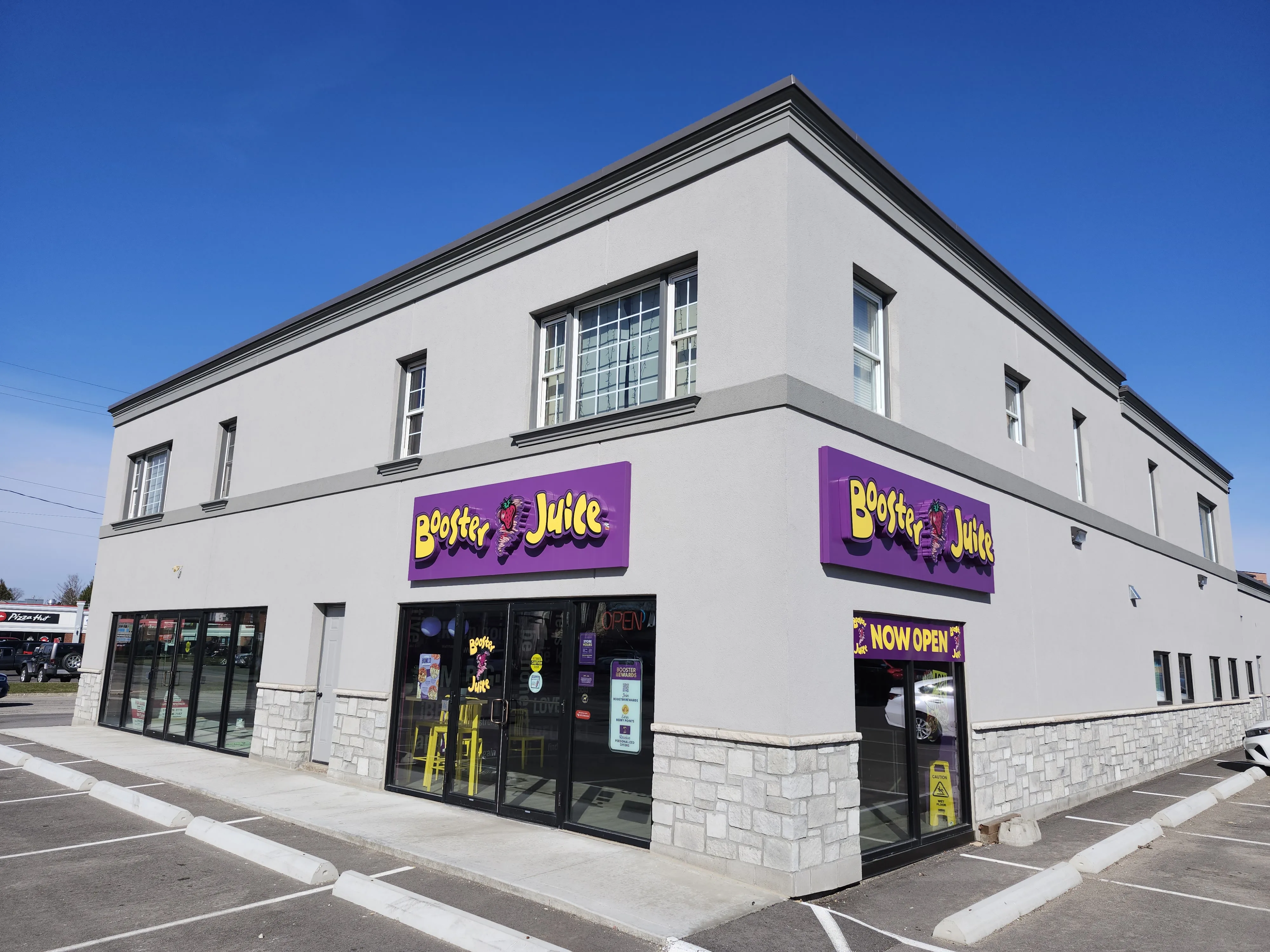 Commercial exterior stucco on corner building, Simcoe Ontario