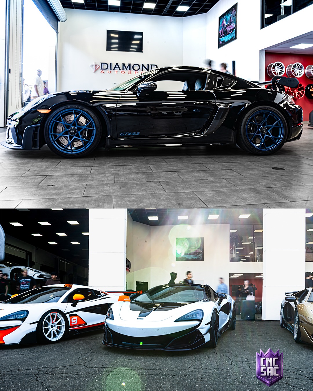 Black supercar on blue wheels parked in a showroom