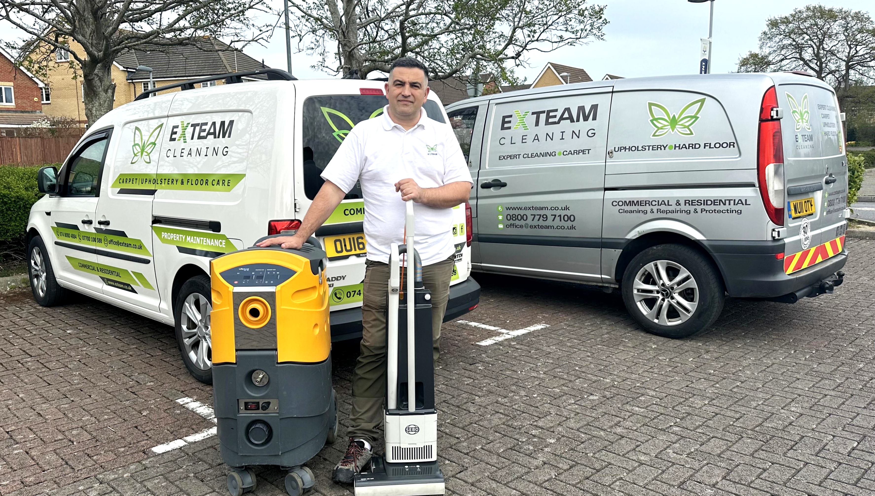 Andy from eXteam Cleaning with professional equipment and branded van