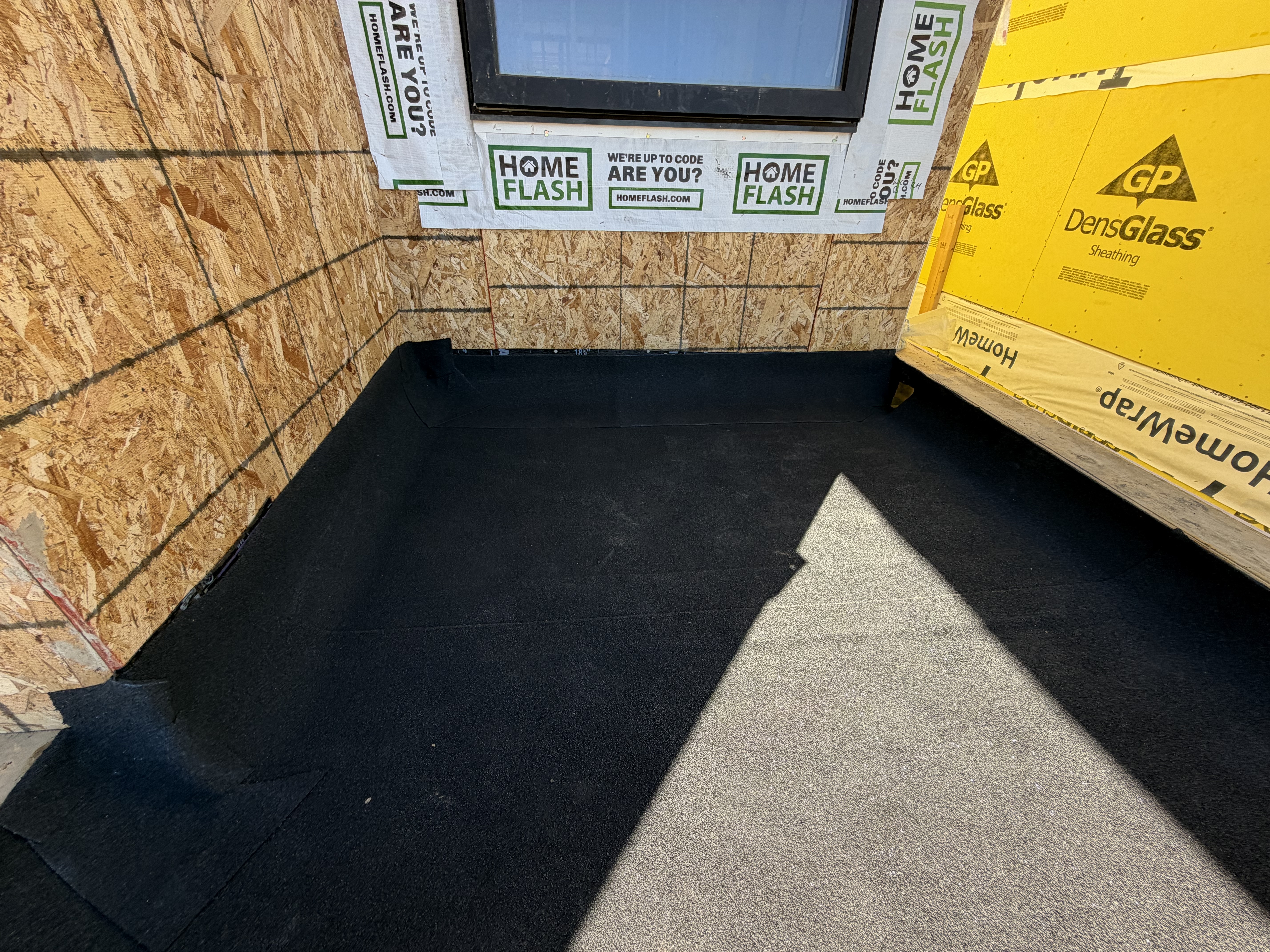 Flashing materials and wall sheathing inside a home, where roof leaks often originate