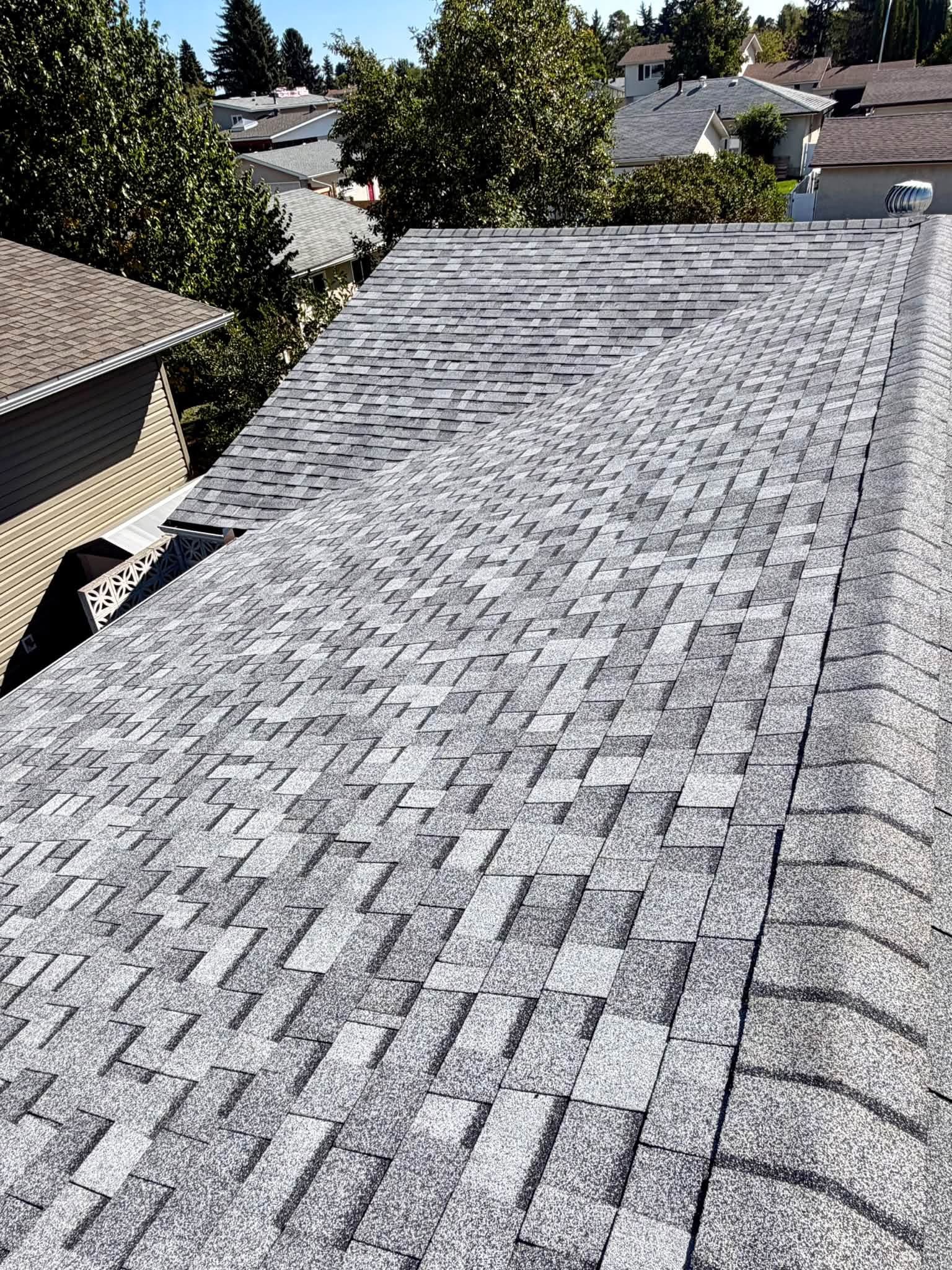 Close view of gray shingles on a residential roof