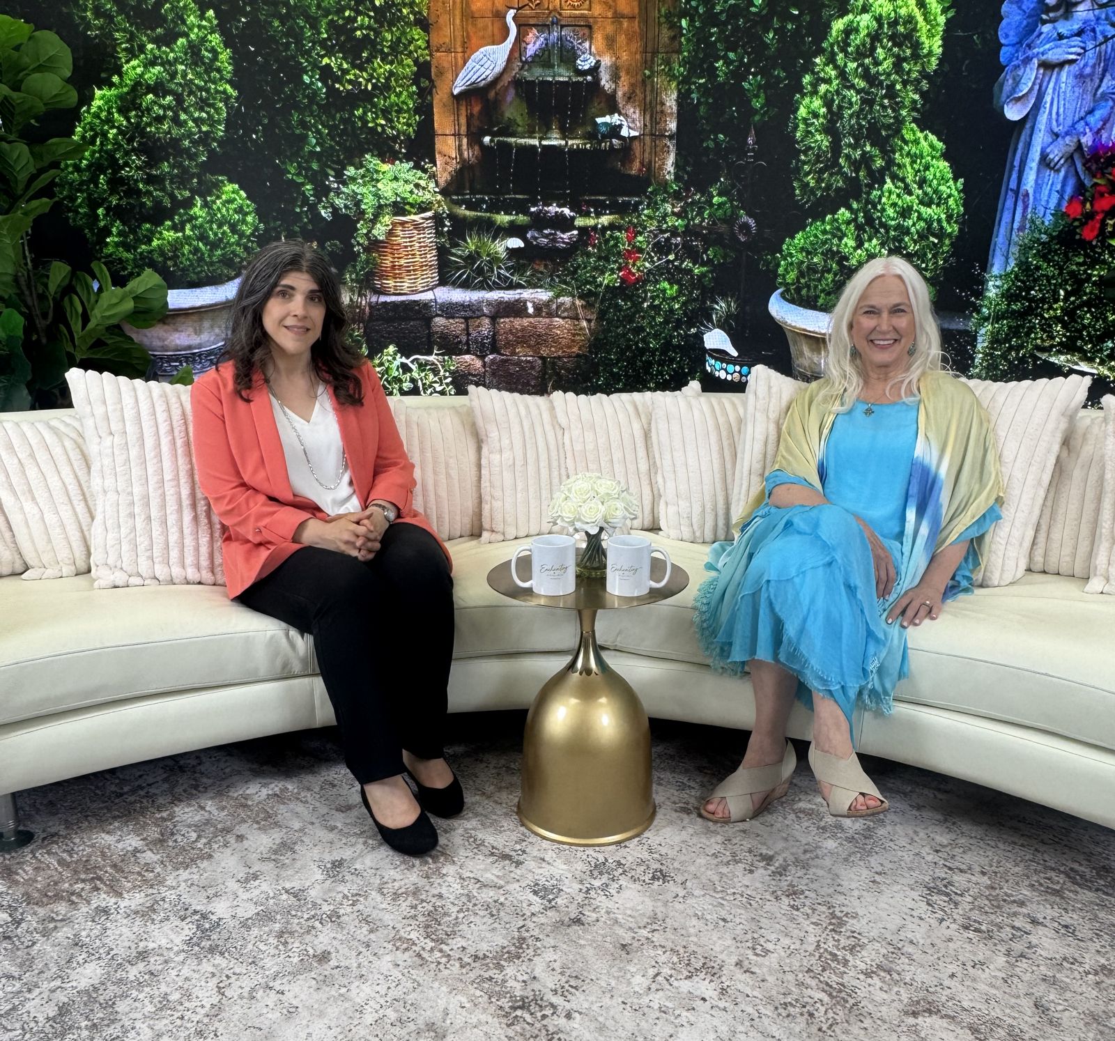 Kathy A. Souza and Janie Seltzer seated together on a television set