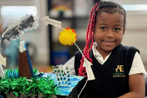 girl with water cycle project