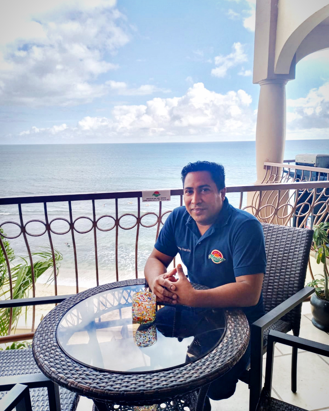 Ricky Garcia on a beachfront balcony at Las Olas, San José del Cabo