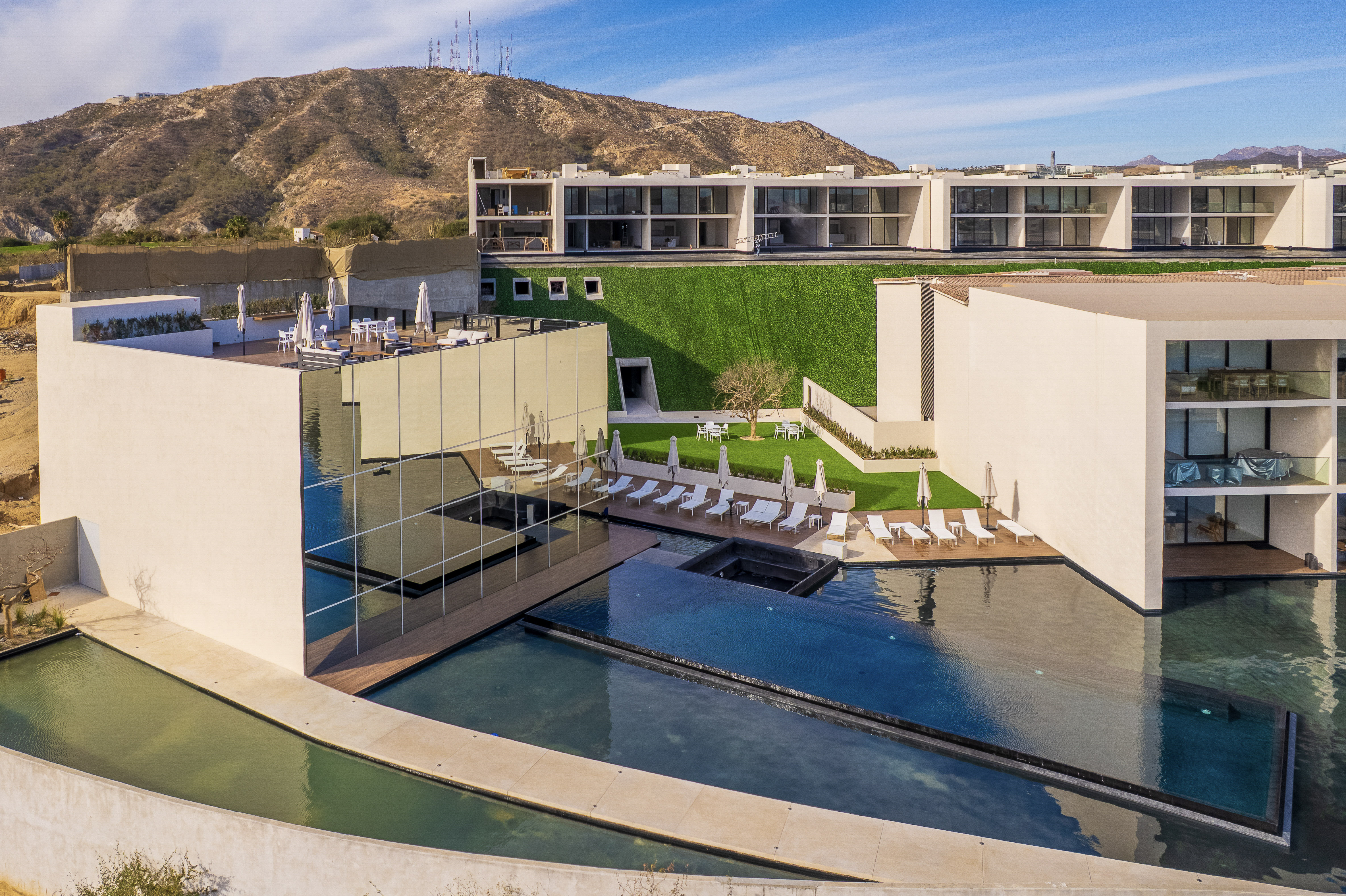 Aerial view of the Cora Los Cabos resort pool
