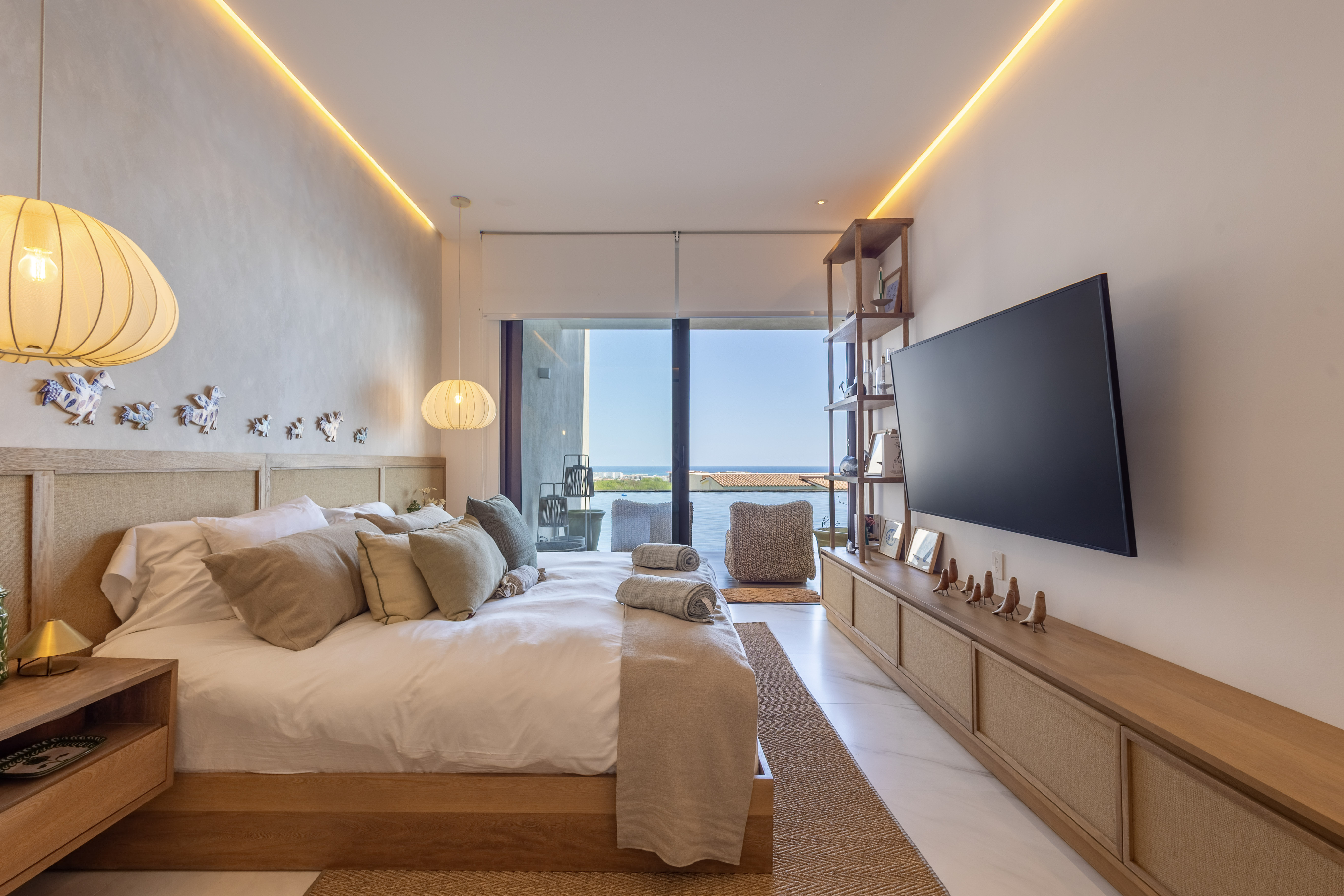 Primary suite with king bed at Cora Sunset B101