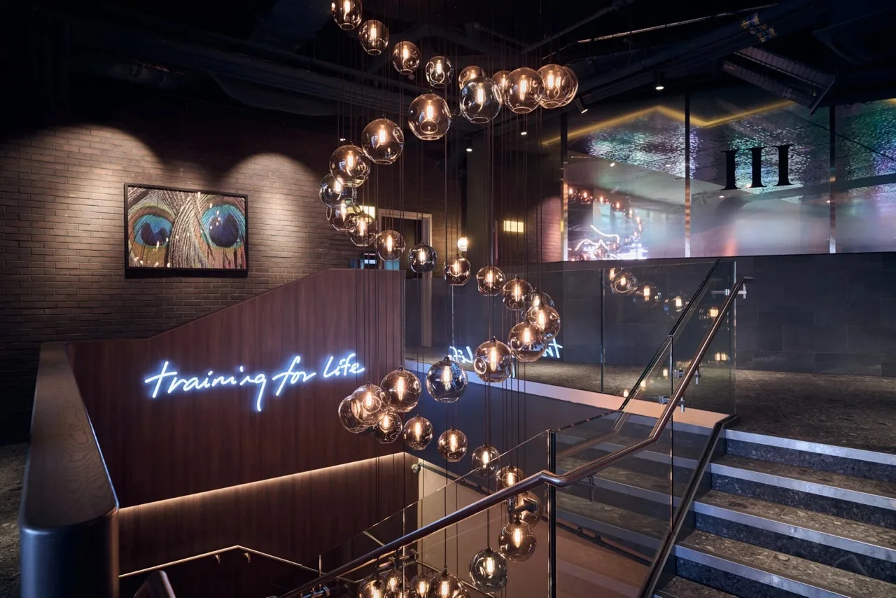 Interior at Third Space Battersea, showing the Training for life sign