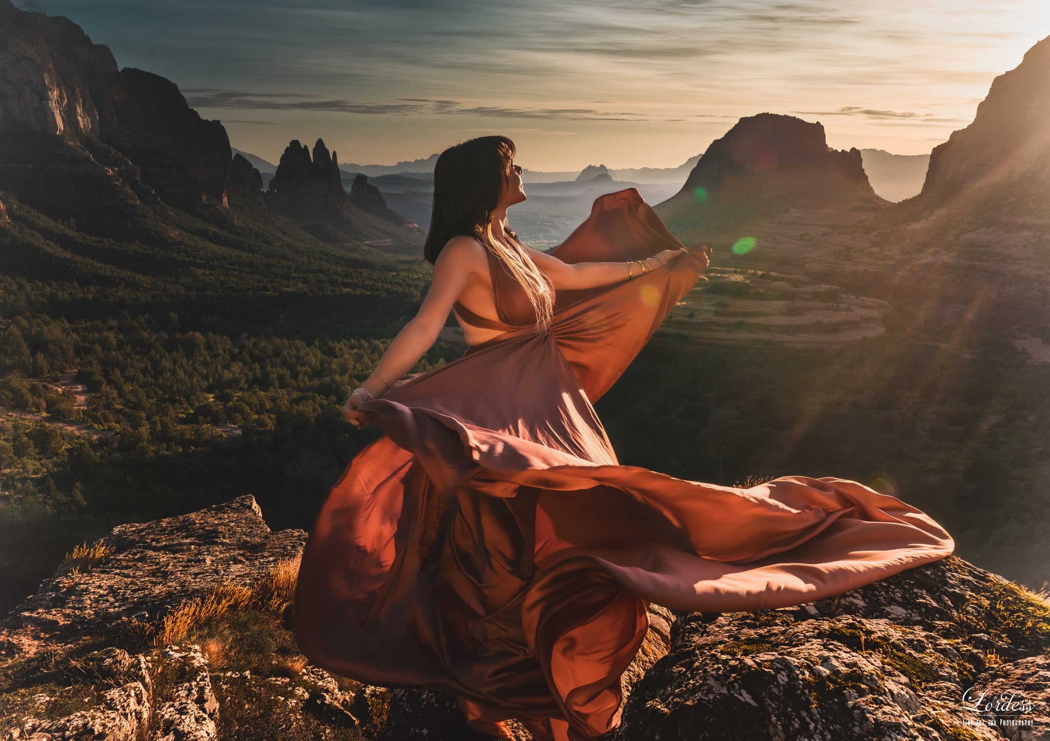 Terii twirling on a cliff in Sedona at sunset