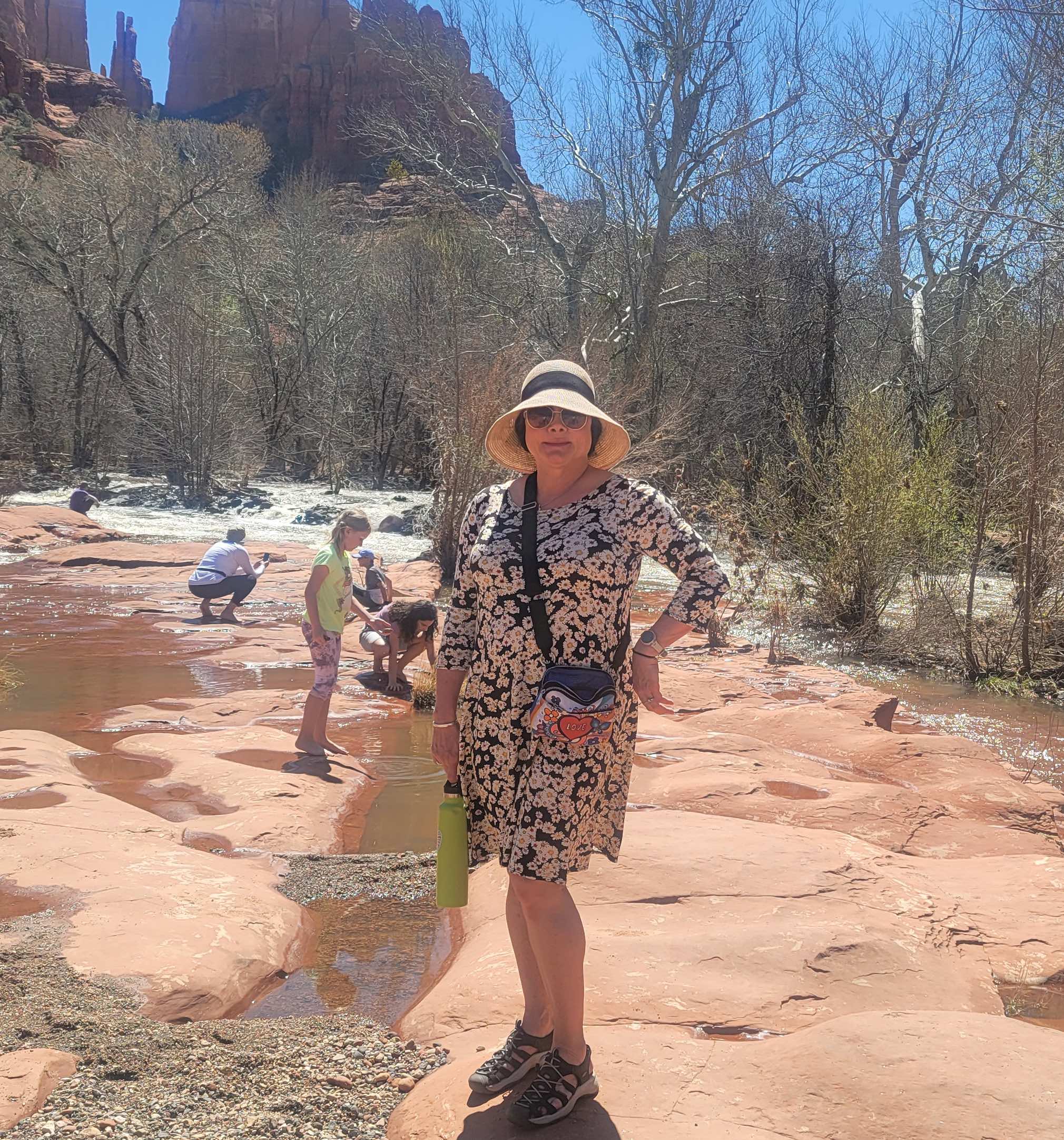 Terii in Sedona in a sun hat and sunglasses