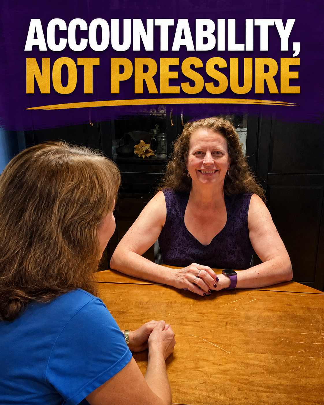 Katharine Caines talking with another woman across a table beneath the words “Accountability, Not Pressure.”