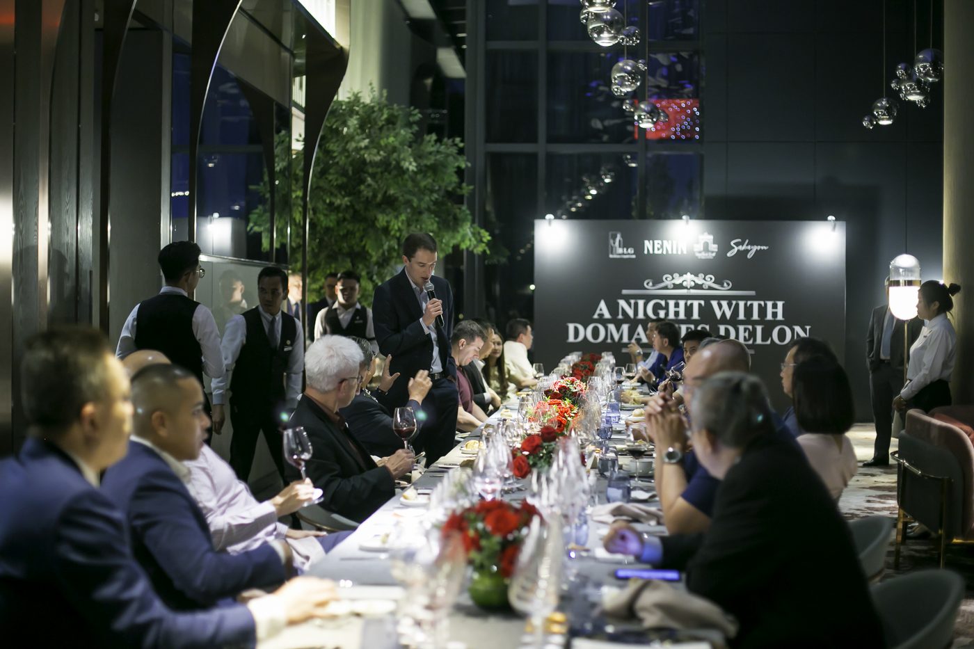 Guests at a wine dinner