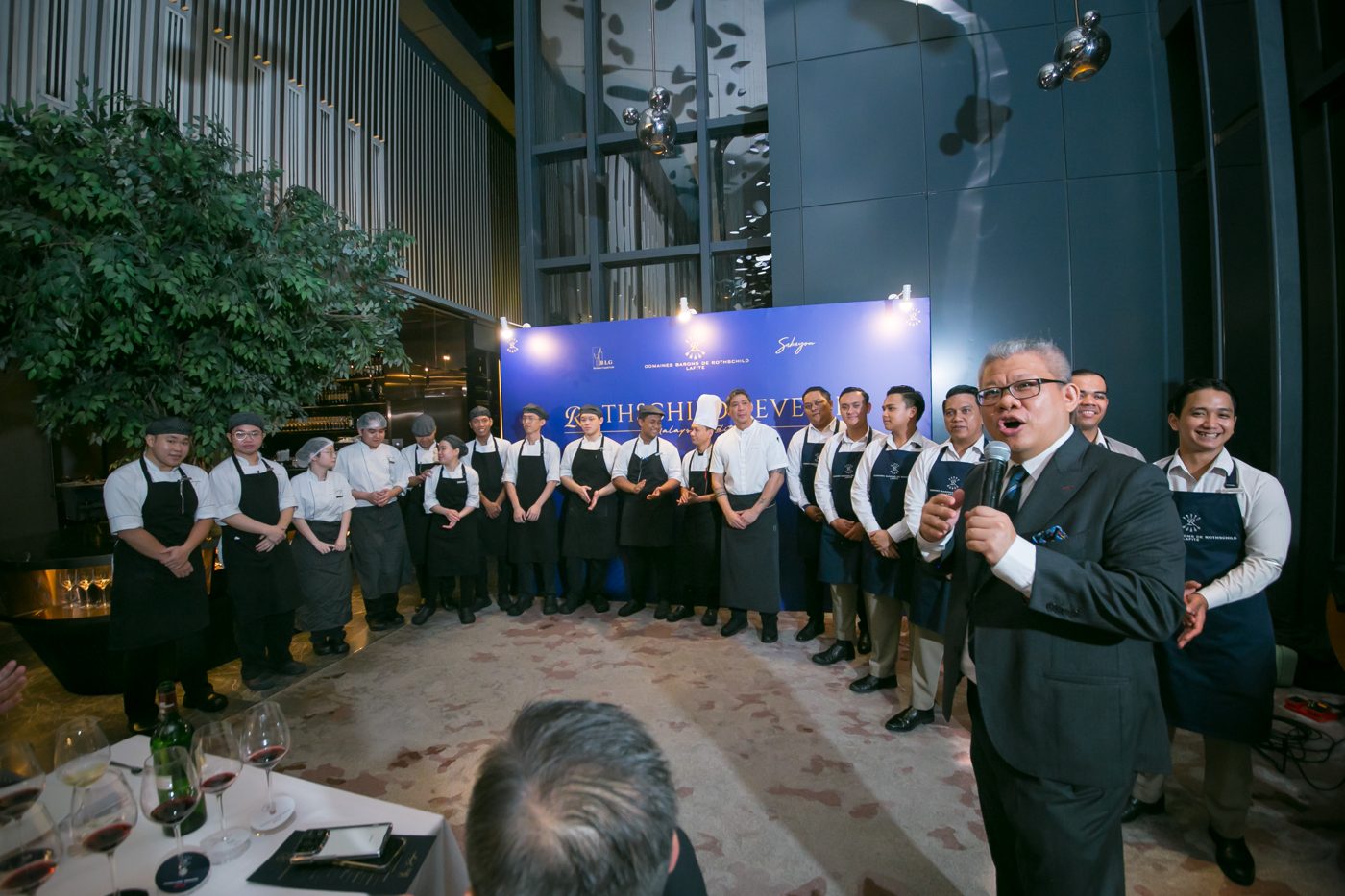Chris Low with the service team at a wine dinner