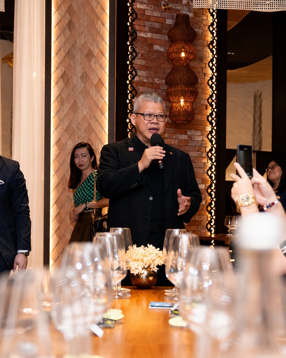 Chris Low speaking at a wine dinner
