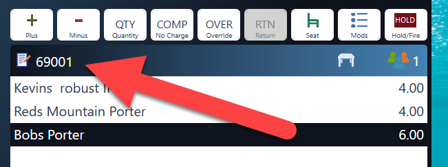 An arrow pointing to the ticket number at the top of the order screen