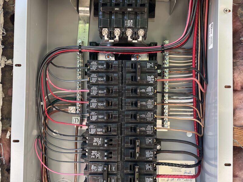 Interior of an electrical panel with neatly dressed conductors