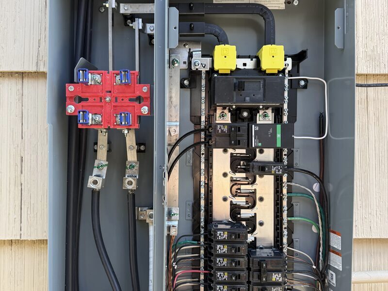 New 200 amp electrical panel with labeled breakers
