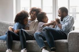 Happy family with children playing