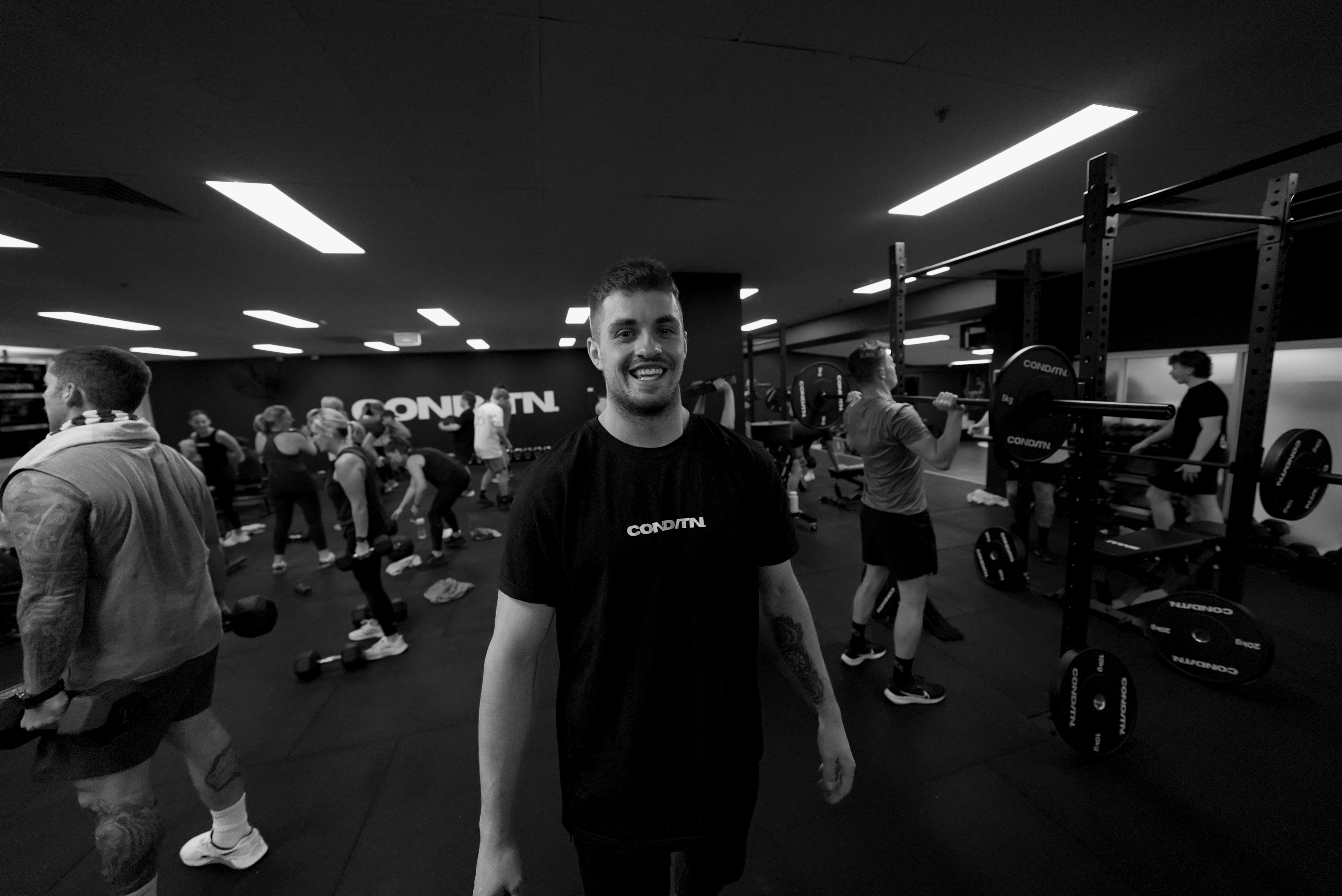 Coach leading a packed class