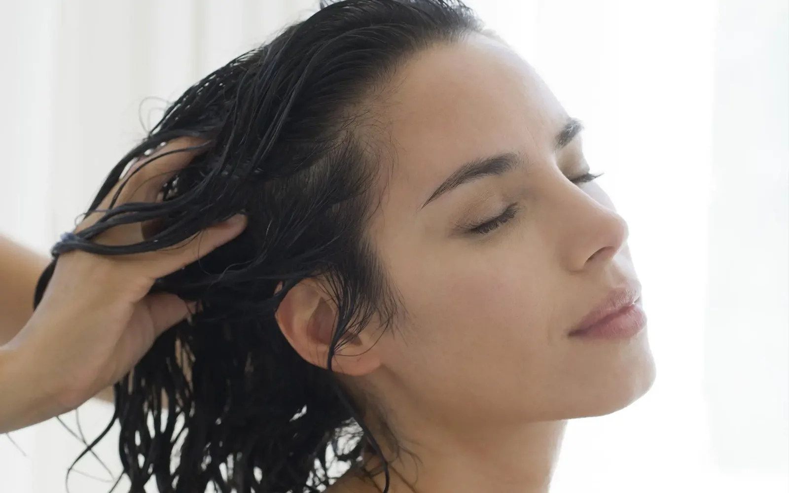 Scalp massage on wet hair