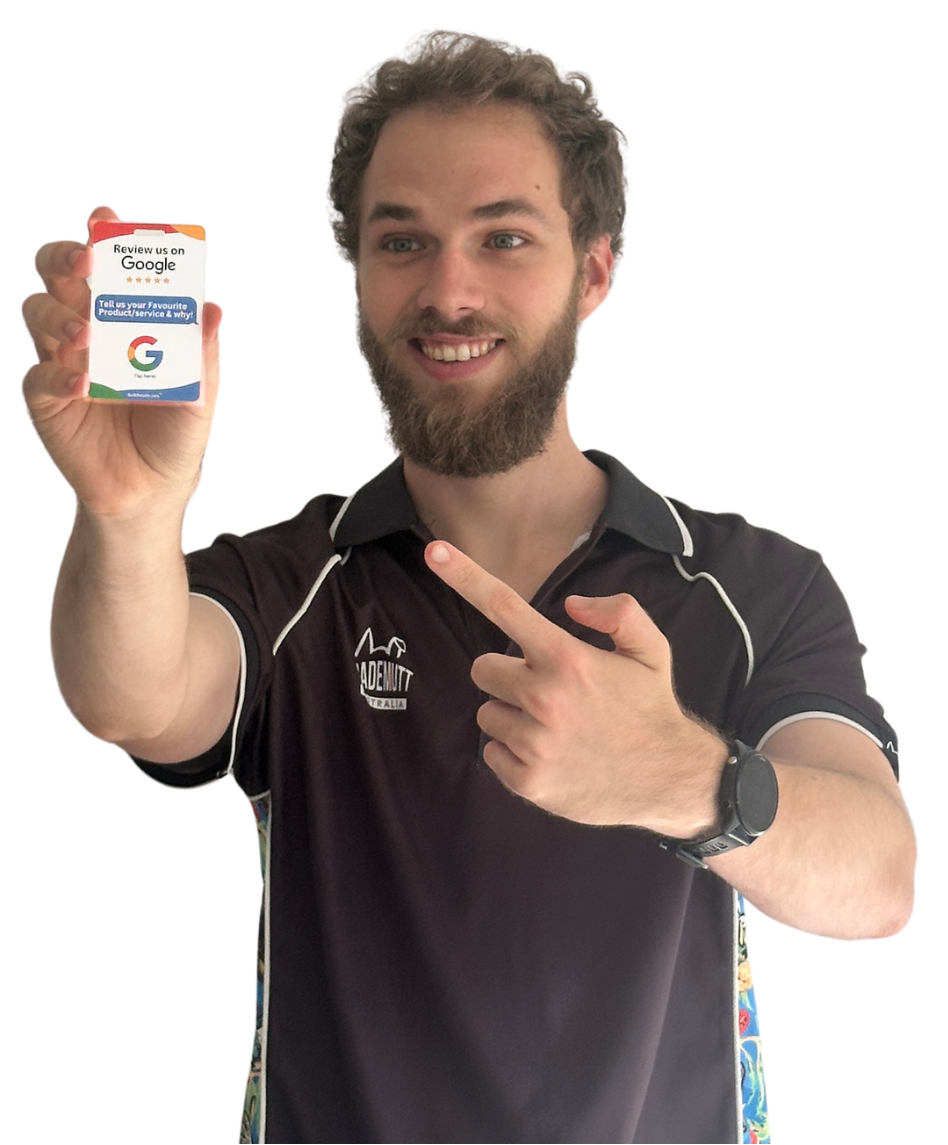 Marcus holding review badge