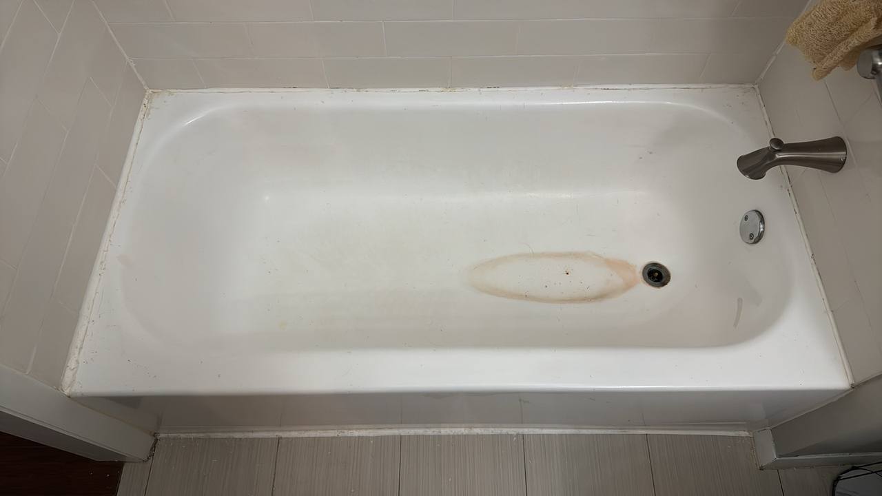 Before — worn bathtub