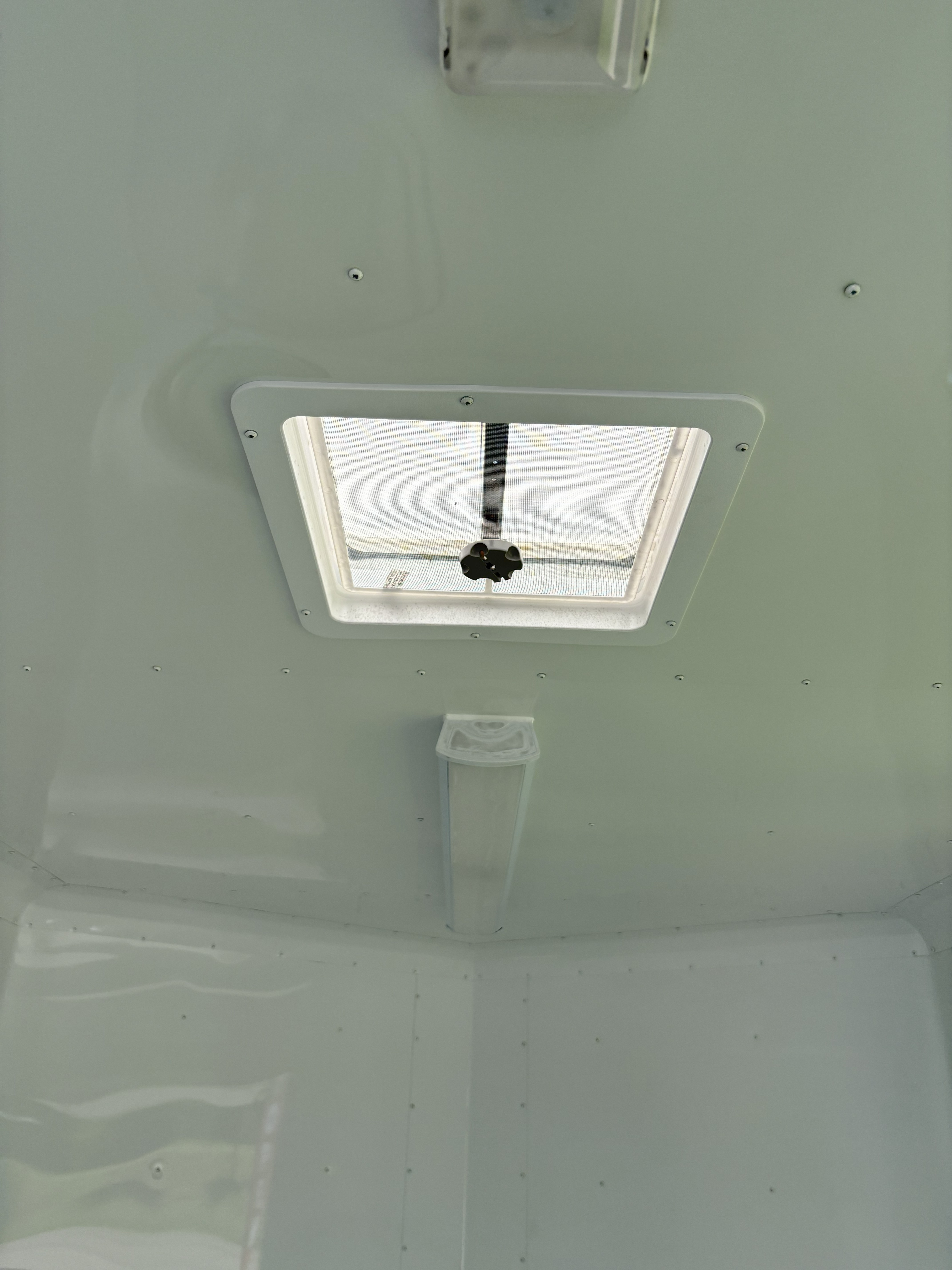 Ceiling skylight and LED lighting in a Devil Dog Trailers build