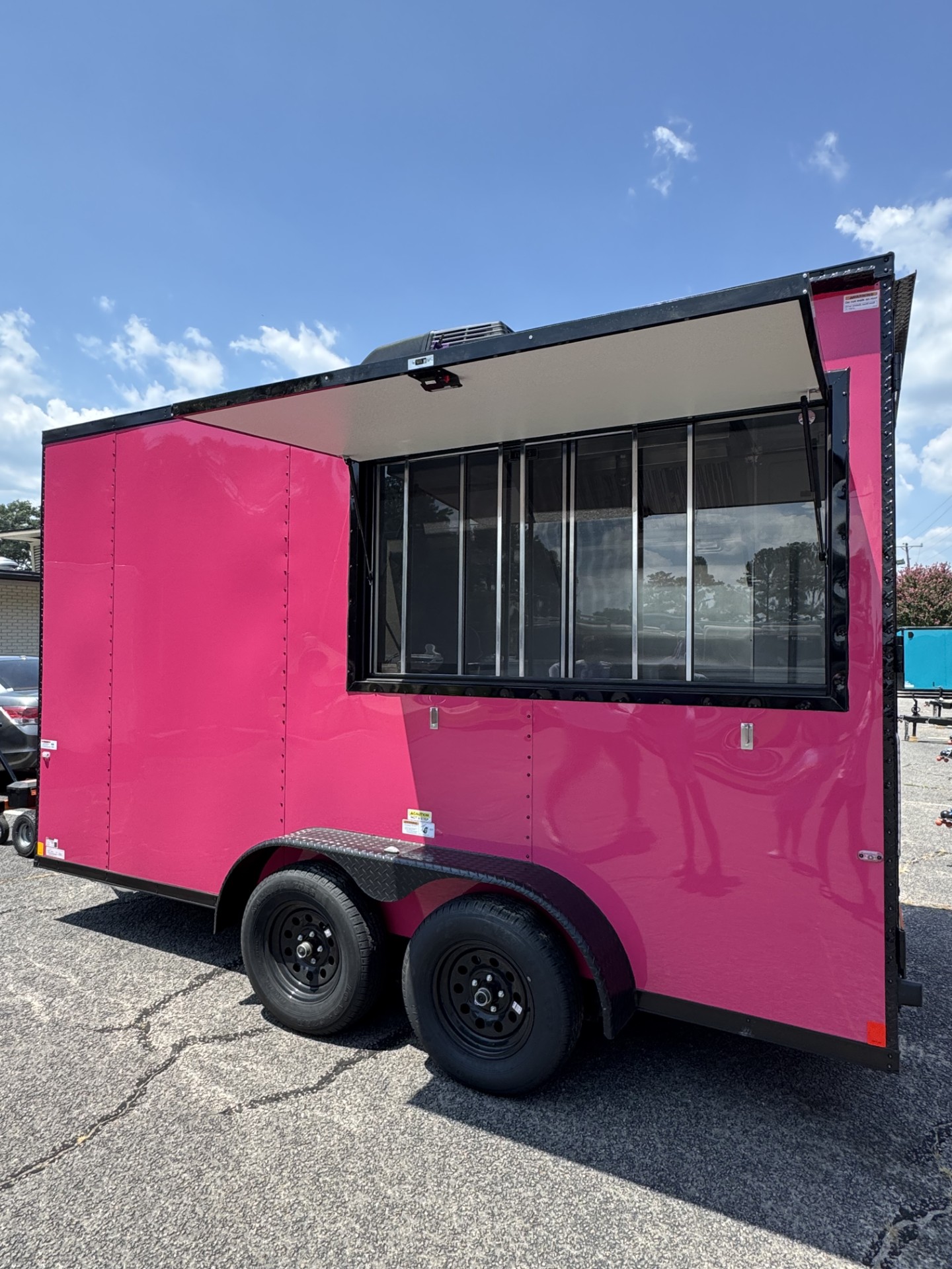 Concession serving windows and doors on a custom Devil Dog Trailers build