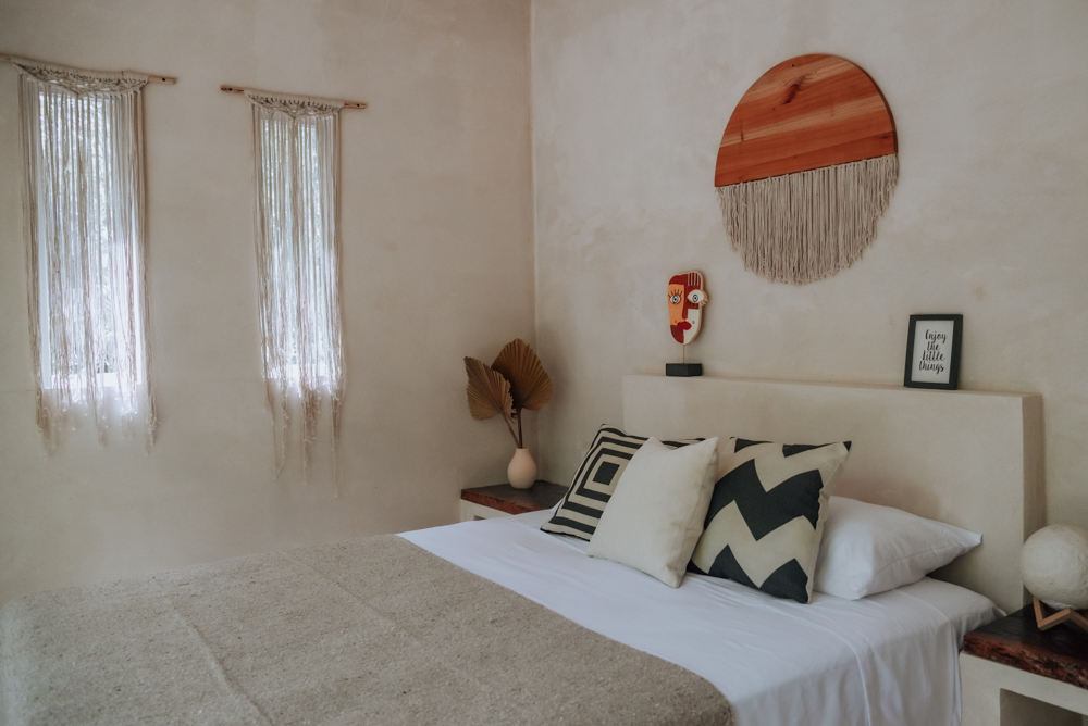 Interior of a private single room with macramé wall hangings