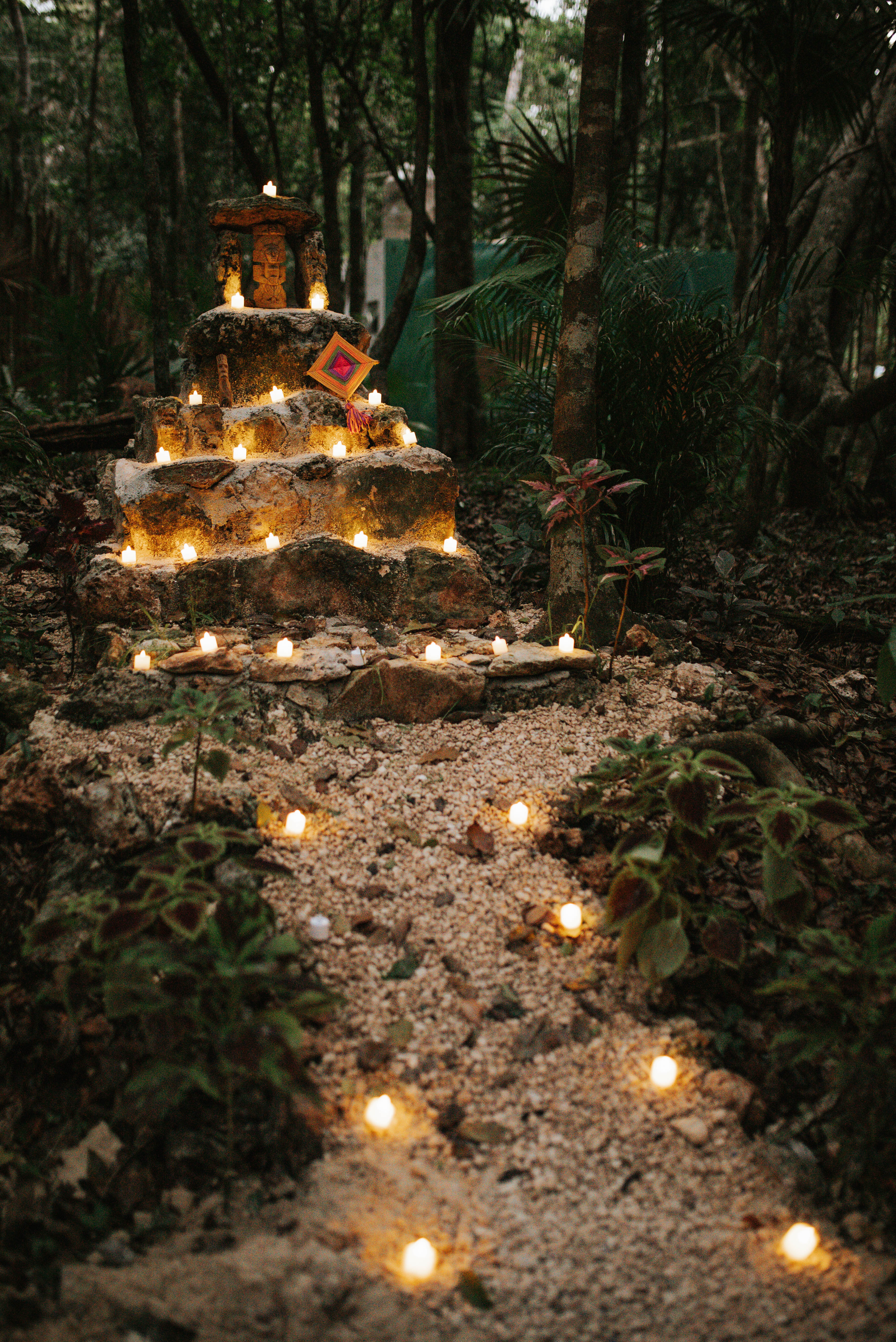 Candlelit jungle altar at Lunita