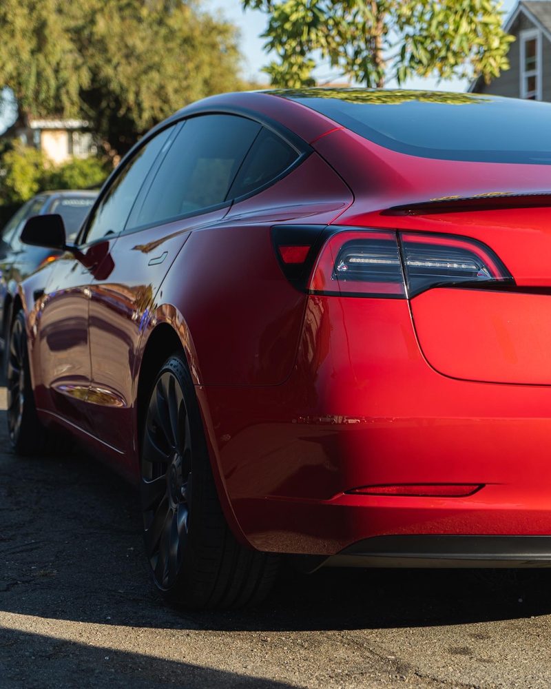 Freshly detailed red Tesla Model 3