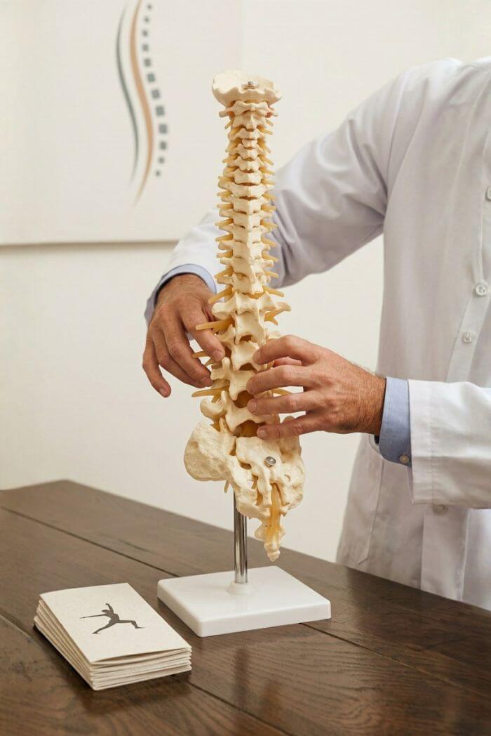 Chiropractor treating a patient in Sault Ste. Marie MI