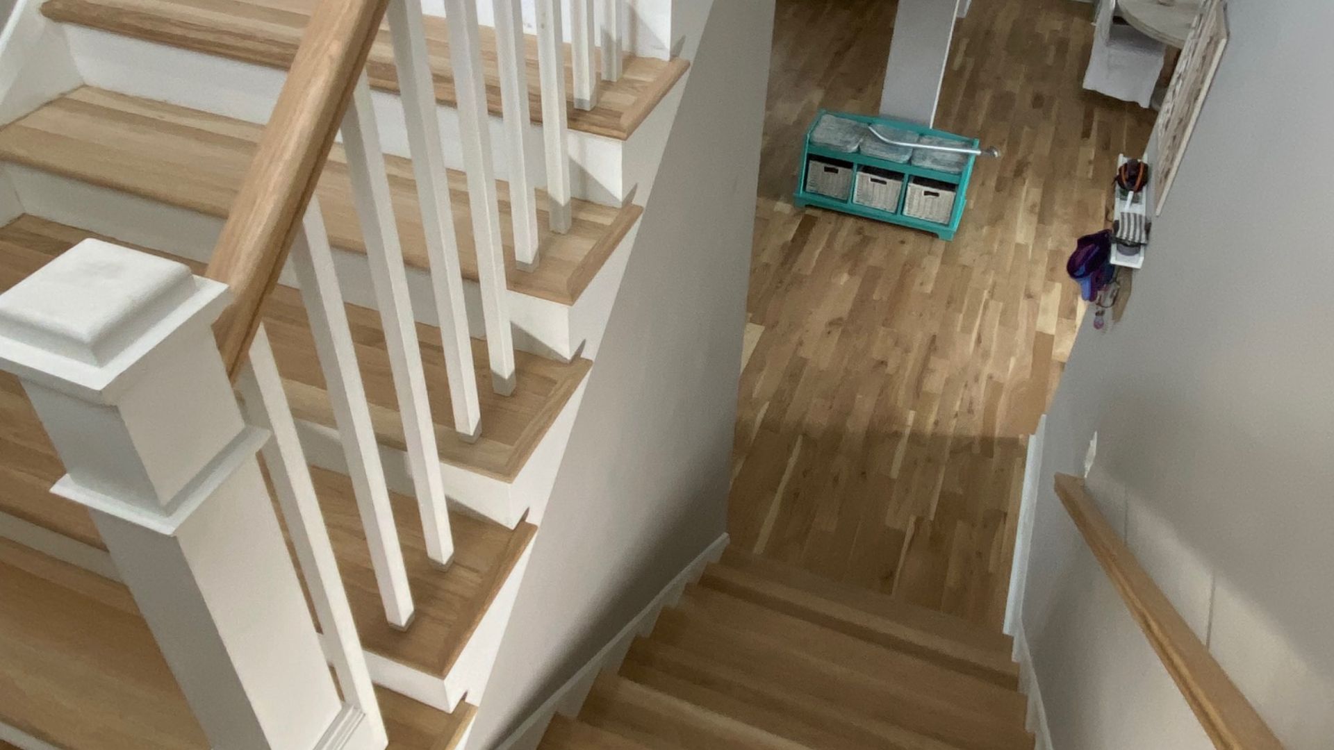 Hardwood handrail installation by Solid Hardwood Flooring LLC