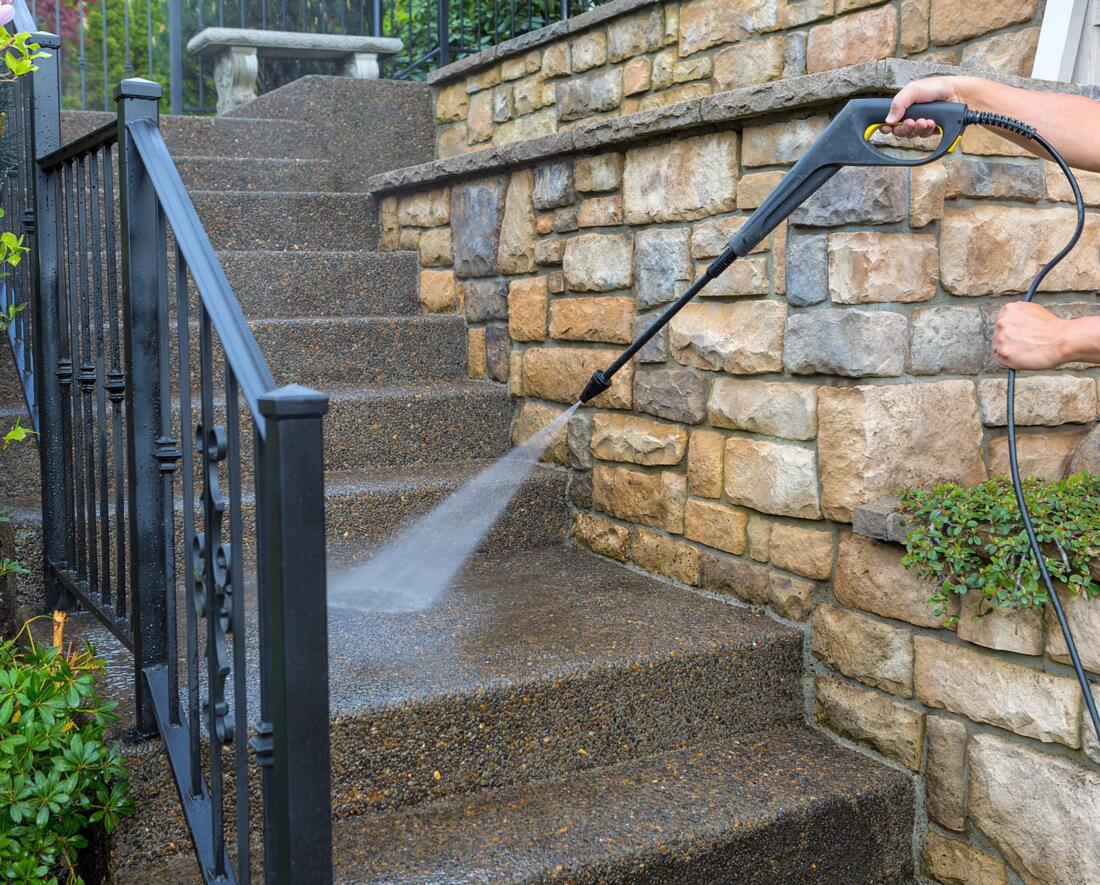 Southeast Cleaning Services pressure washing stone steps and a walkway