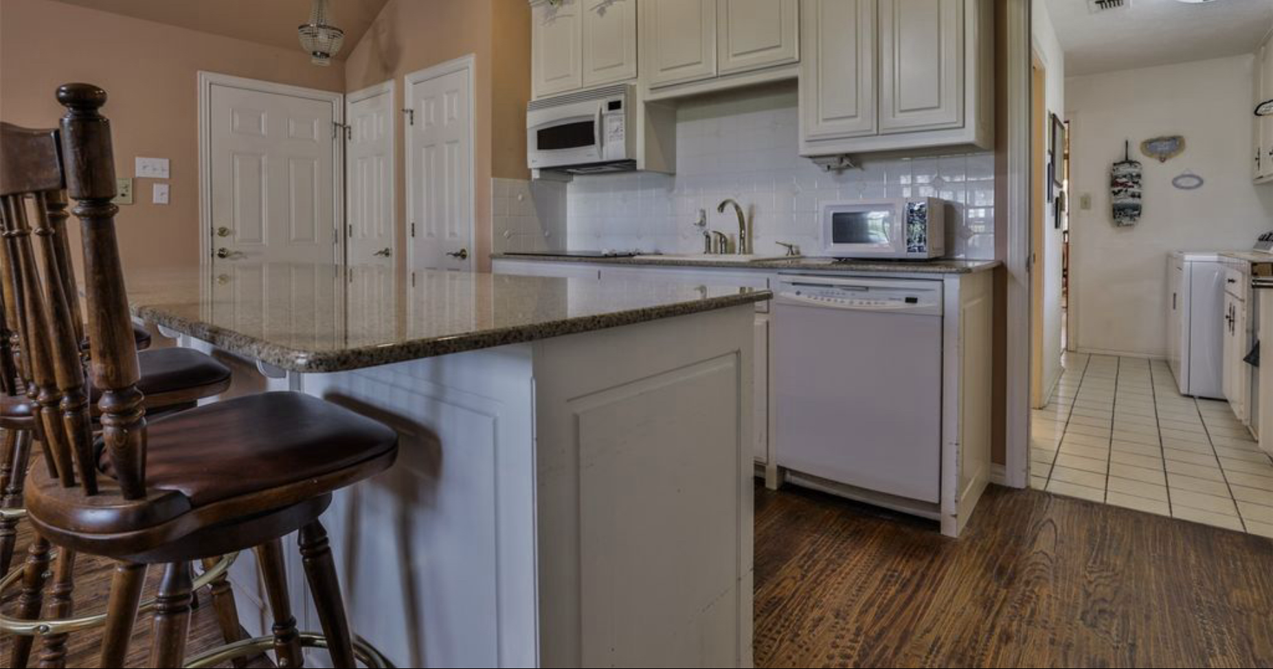 Kitchen and common area near The Master Suite at Safe Harbor Farmstead
